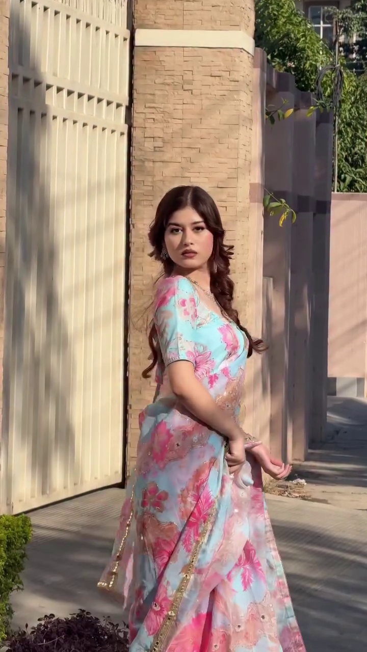 Pastel Blue Floral Organza Saree with Gold Trim