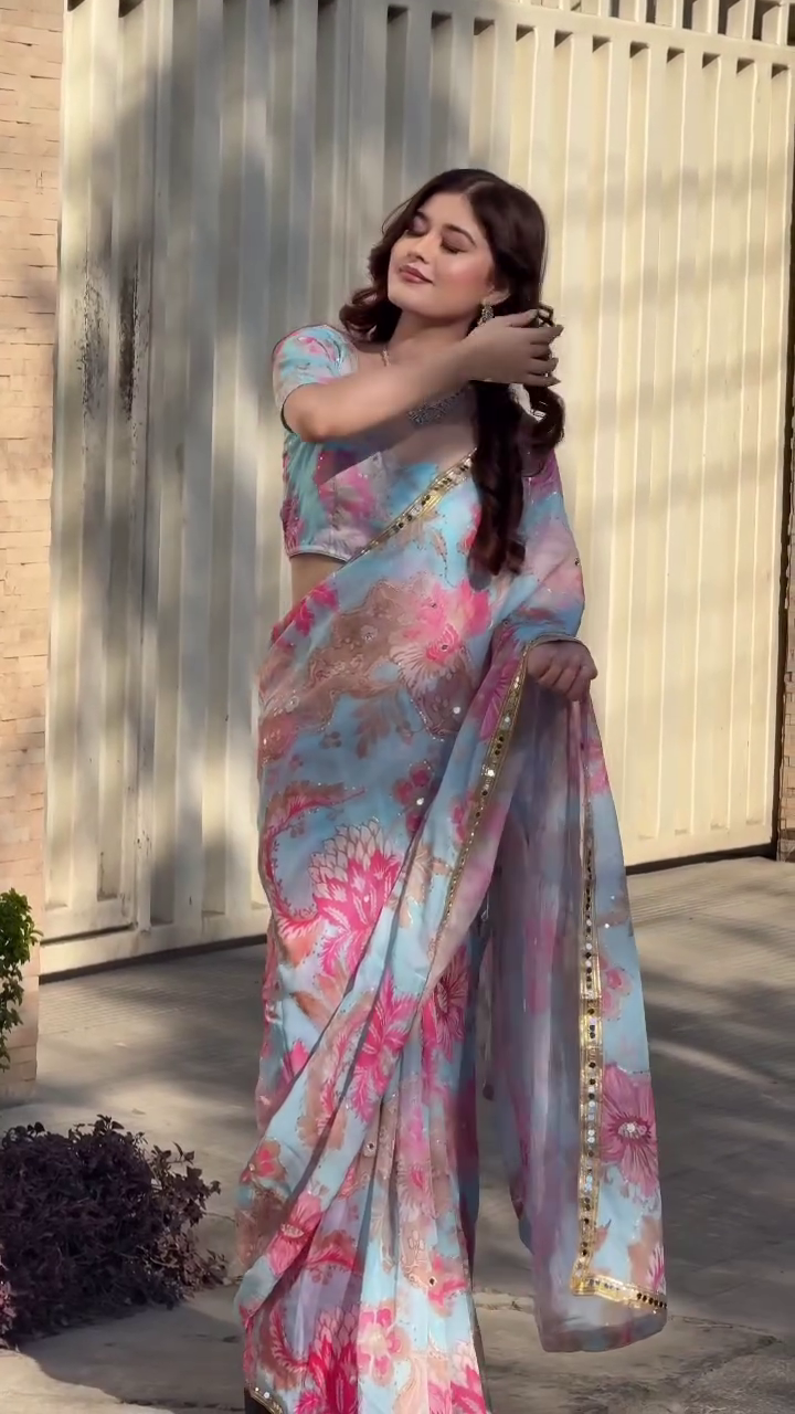 Pastel Blue Floral Organza Saree with Gold Trim